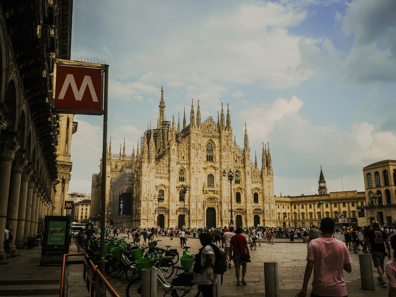 Crowded square in front of a large ornate cathedral