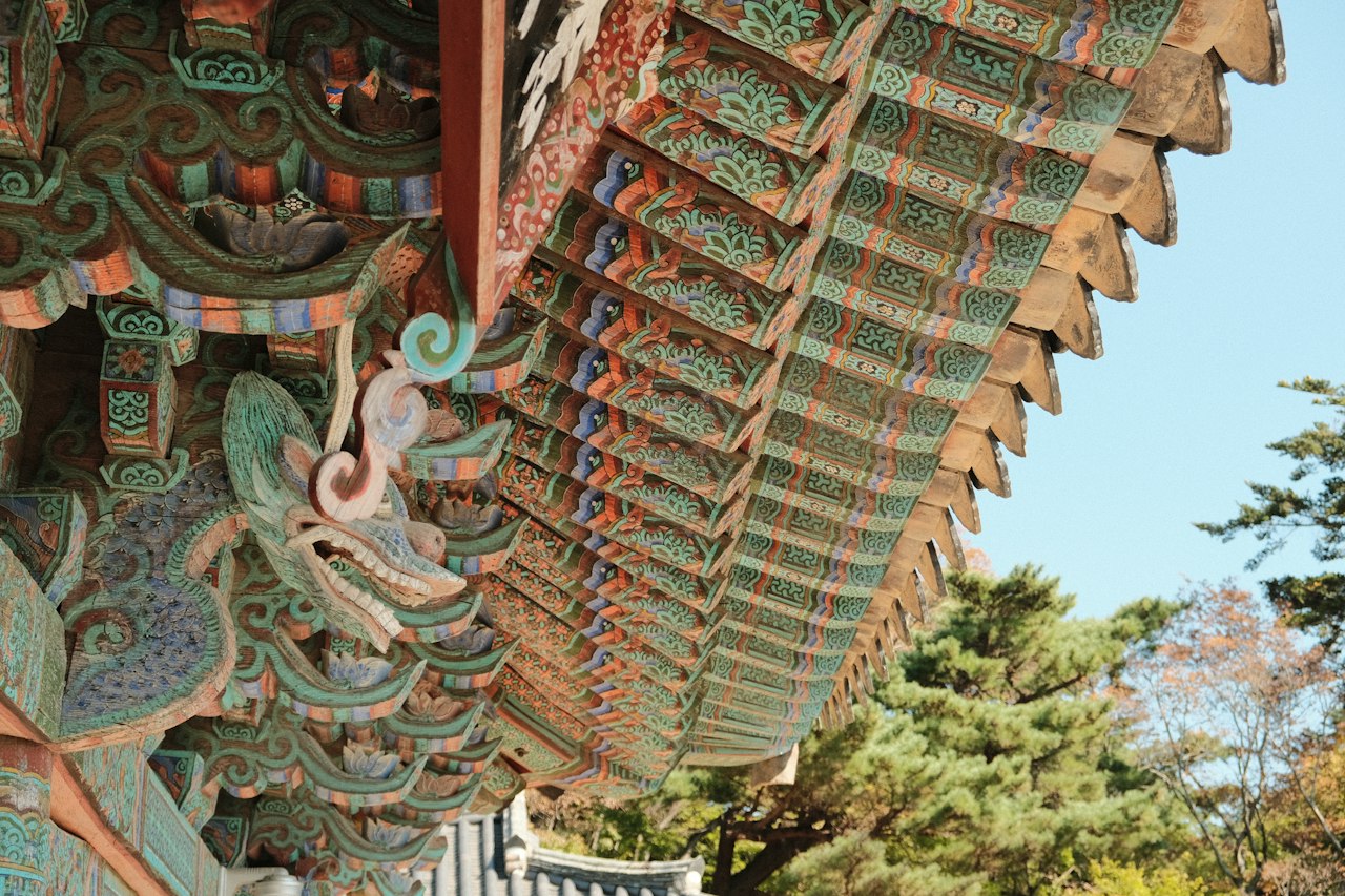 a close up of a roof with a bird on it