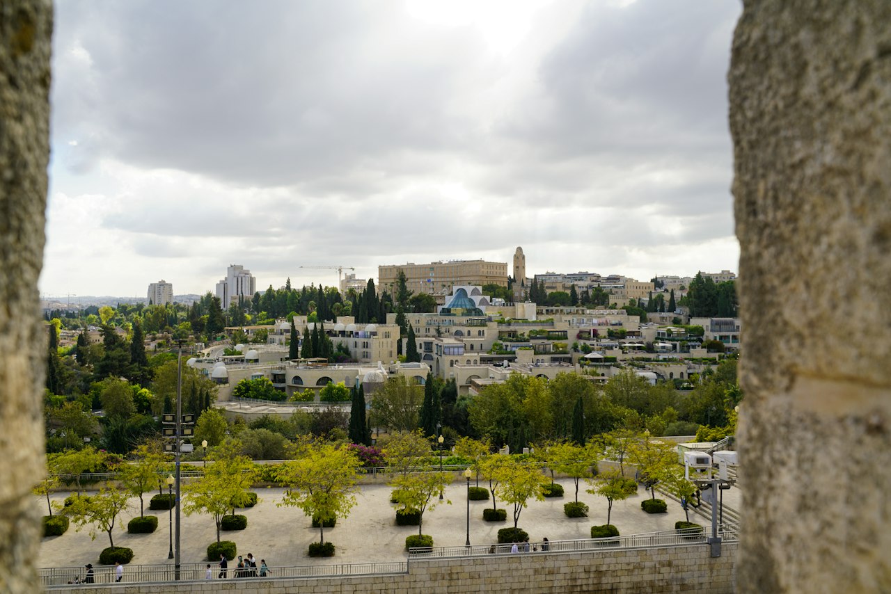 View of jerusalem cityscape with historic buildings and trees