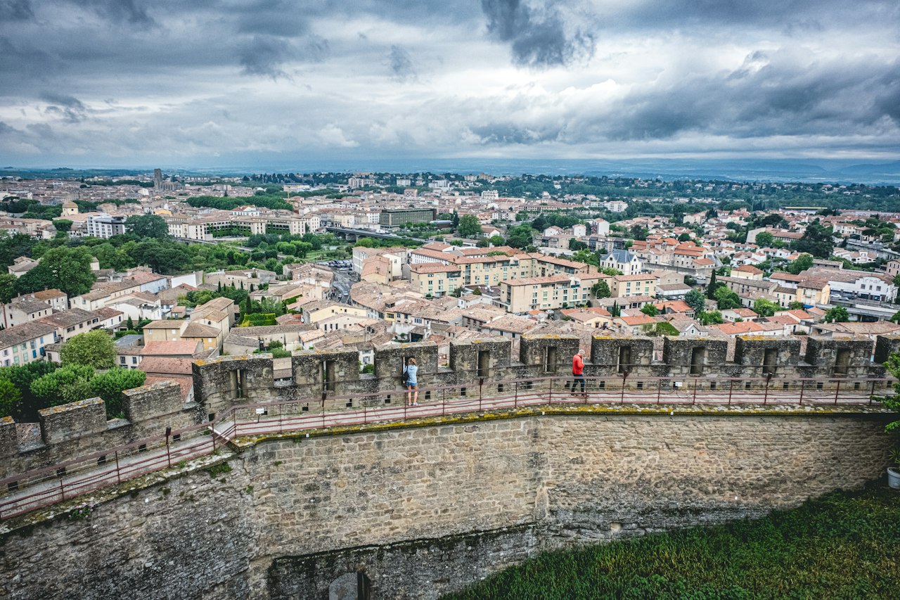 City view with a stone wall in the foreground